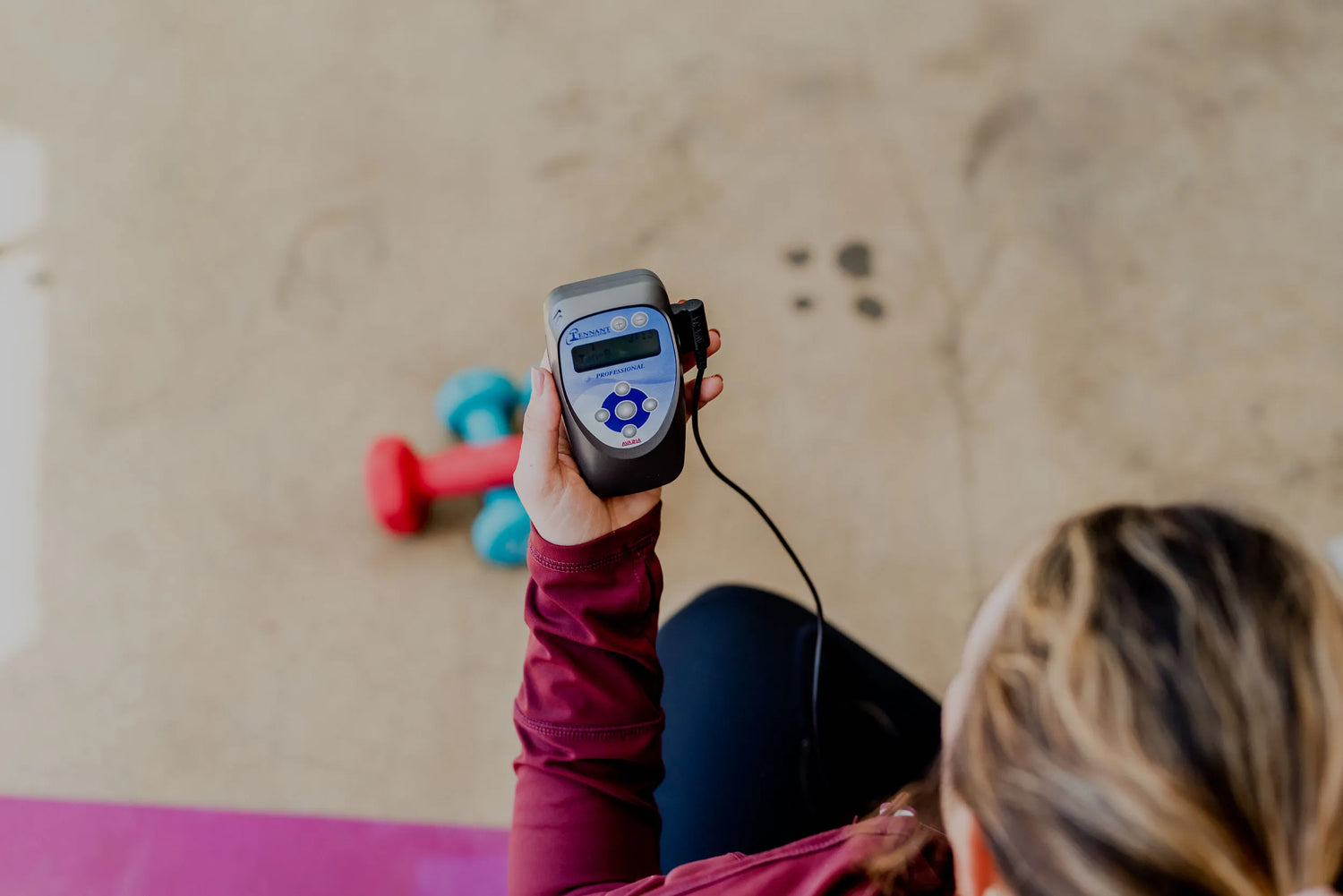 woman using the biomodulator pro 